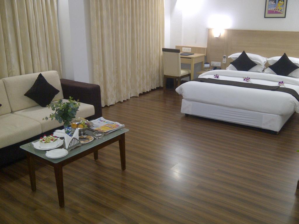 Hotel Ambient Turret Bangalore Habitación foto